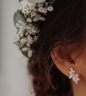 68742-99 - Novia - 9 par ørepynt på display, med plakat og hvit rose thumbnail
